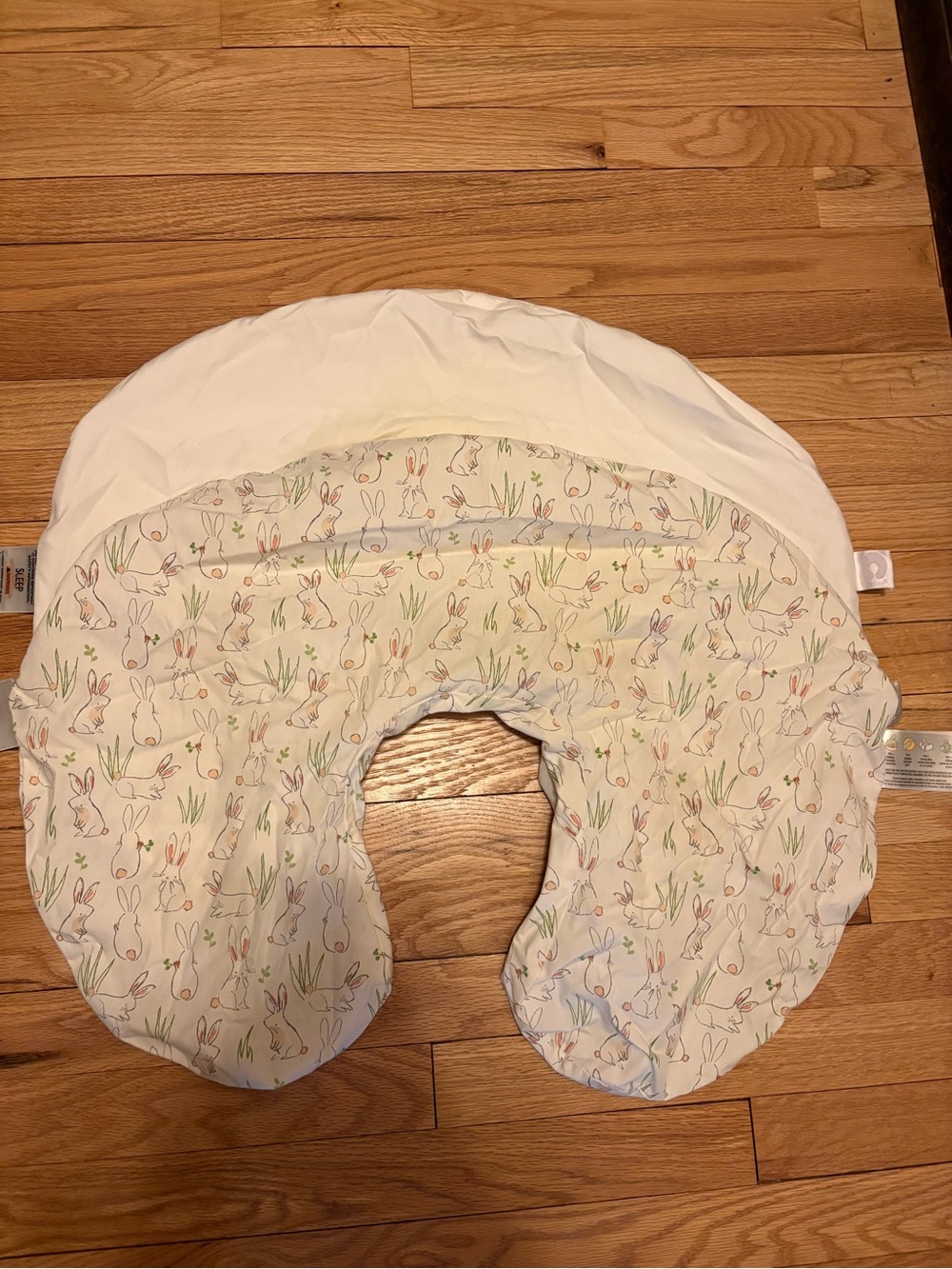 2 Boppy Nursing Pillow Covers one in white and one White with Bunny Print.